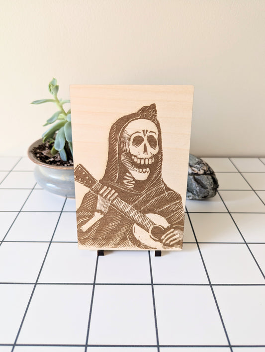 Skeleton Playing The Guitar