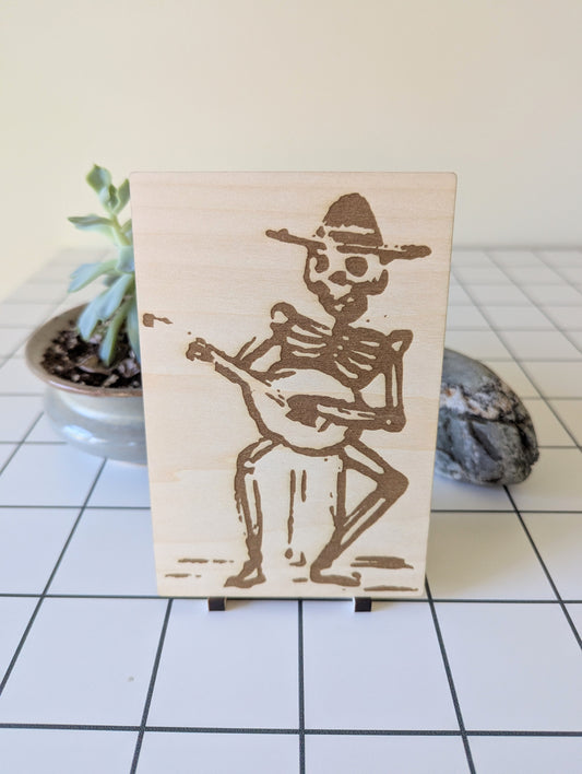 Skeleton Playing Guitar
